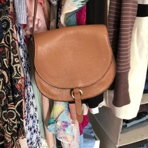 Cross body saddle bag